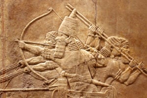 Assyrian stone relief carving.